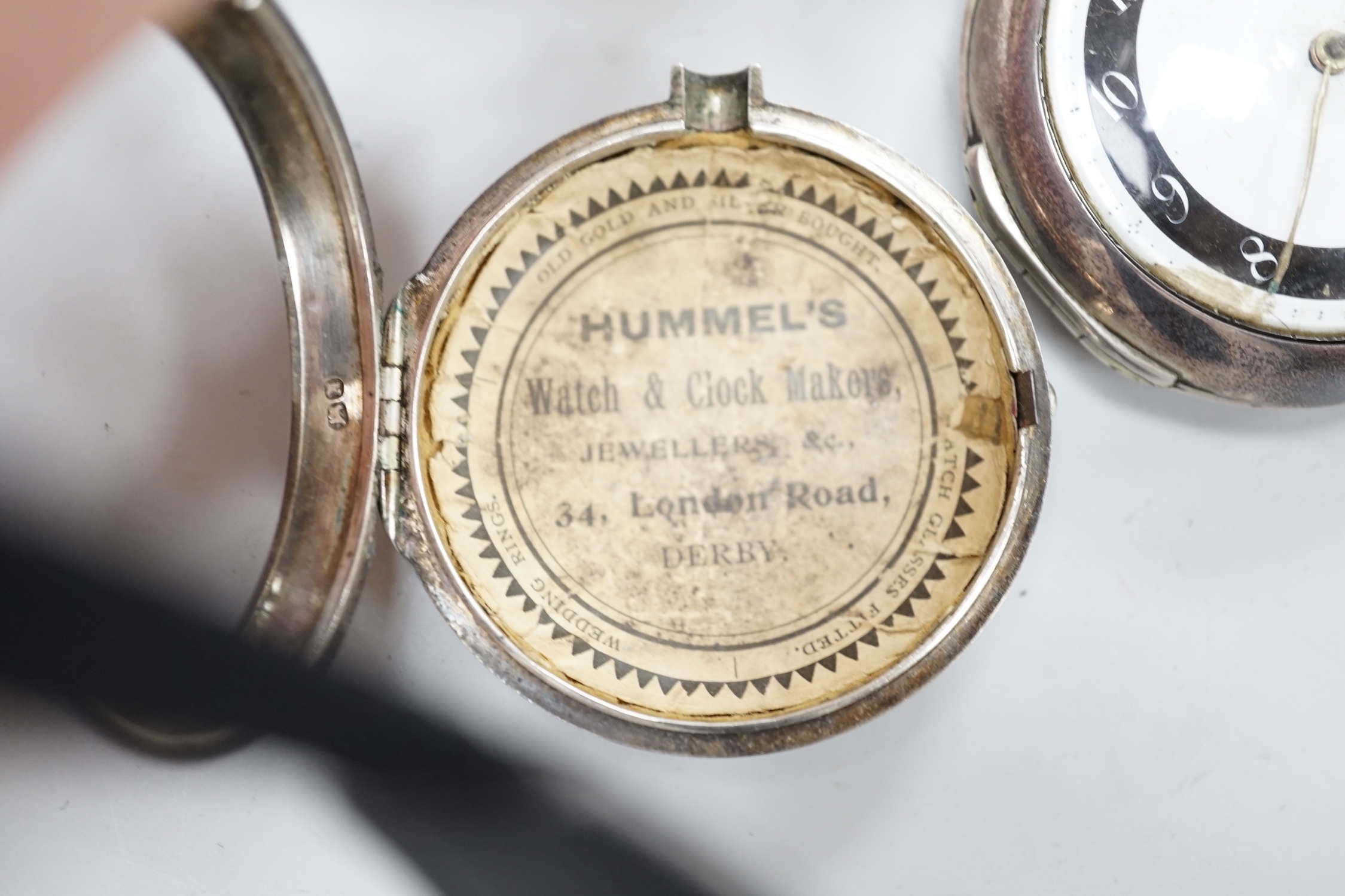 Two George III silver pair cased keywind verge pocket watches by Knight of Thaxted (black ring) and Spink of Windsor.